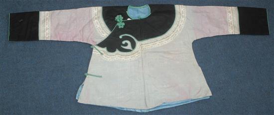 Two Chinese embroidered silk and metal thread rank badges and two childrens silk brocade robes,